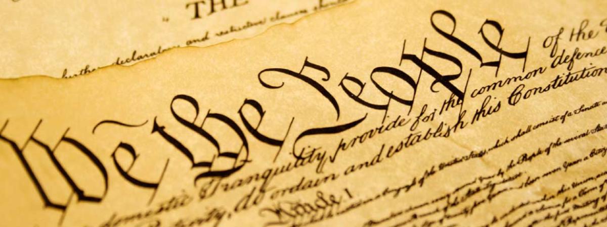 American Studies Program at Minneapolis College closeup of "We the People" text of the Constitution