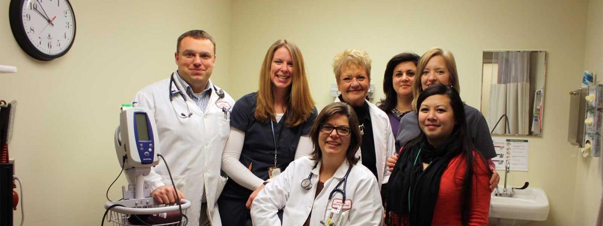 The Student Health Clinic at Minneapolis College Seven staff posing in the Student Health Clinic at Minneapolis College