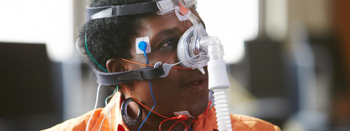 Sleep Technology (Polysomnography) Degree Program at Minneapolis College Student wearing some sleep technology apparatus on their head at Minneapolis College