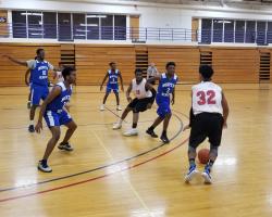Basketball Game Vs. North Hennepin students playing basketball