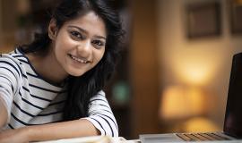 Apply as a New Student Student smiling