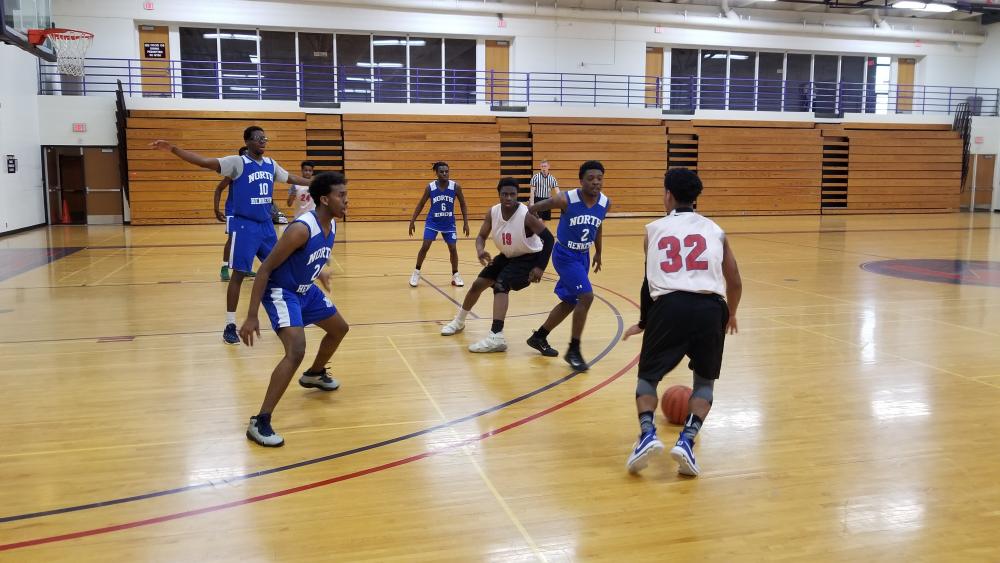 students playing basketball