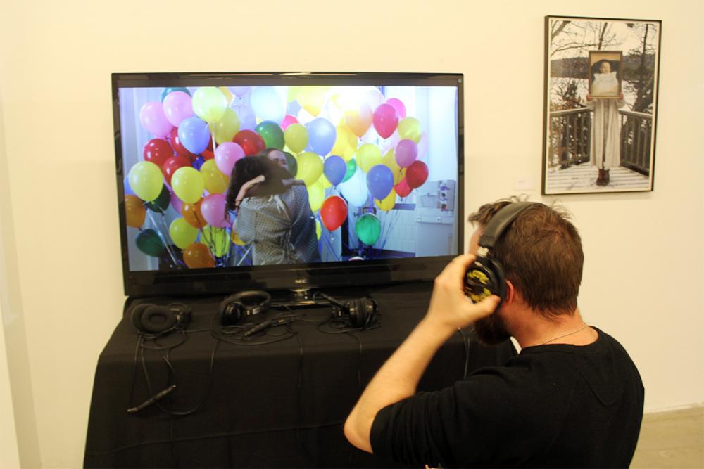 Man listening to video